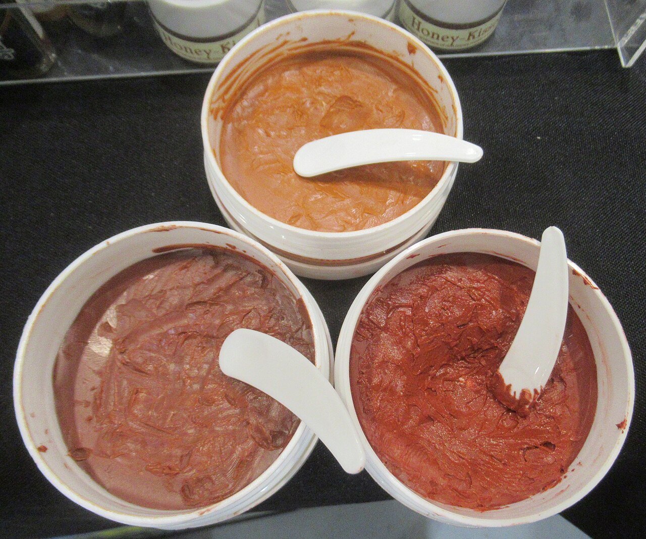 Tinted skincare products arranged on a surface